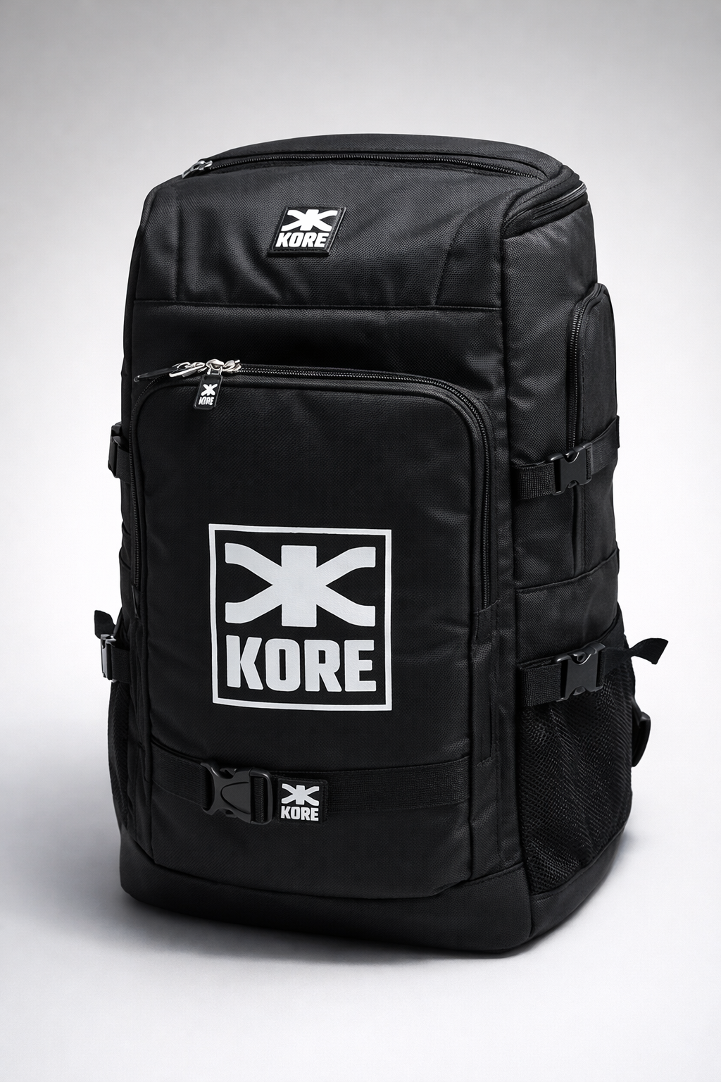 Black Kore backpack with multiple compartments and front logo, ideal for travel, school, and everyday use